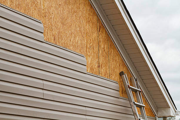 Professional Emergency Siding Repair technician working in Milldale, CT